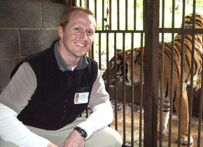 dr. bryce willcox with a tiger!